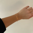 Bracelet doré fleurs strass